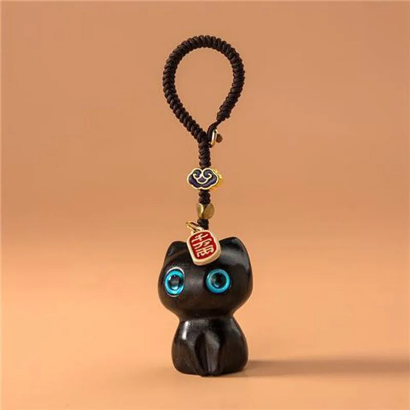 Porte clef chat porte bonheur face