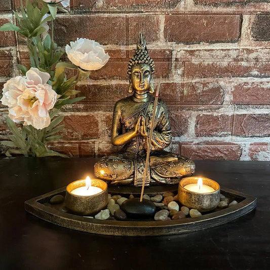 Statue bouddha lumiere et encens table